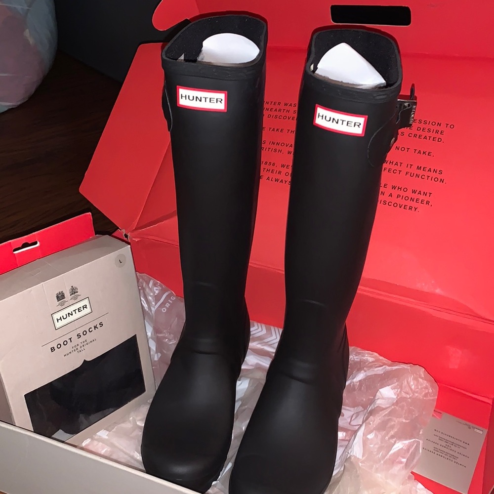 Brand new Hunter boots and Tall black boot socks (size large)